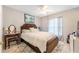 Bedroom with a double bed, dresser, and ceiling fan at 4353 Dinner Lake Dr, Lake Wales, FL 33859