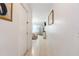 Bright hallway with tile flooring and access to bedroom at 4353 Dinner Lake Dr, Lake Wales, FL 33859