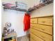 Well-organized bedroom closet with shelves and dresser at 8105 Coconut Palm Way # 204, Kissimmee, FL 34747