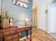 Entryway with wooden desk, lamp, and a fire extinguisher at 8105 Coconut Palm Way # 204, Kissimmee, FL 34747