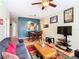 Open living space with a view of the kitchen and dining area at 8105 Coconut Palm Way # 204, Kissimmee, FL 34747