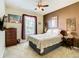 Bright bedroom with a double bed and large window at 8105 Coconut Palm Way # 204, Kissimmee, FL 34747