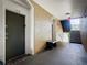 Apartment building hallway with a bench and stairs at 8105 Coconut Palm Way # 204, Kissimmee, FL 34747