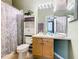Bathroom with a shower/tub combo and wood vanity at 8105 Coconut Palm Way # 204, Kissimmee, FL 34747