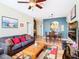 Spacious living room with a view into the kitchen and dining area at 8105 Coconut Palm Way # 204, Kissimmee, FL 34747