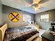 Bedroom with a full-size bed and wall decor at 2920 Gause St, Bartow, FL 33830