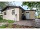 Backyard view with patio, grill, and partially visible shed at 2920 Gause St, Bartow, FL 33830