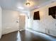 Clean, blank basement with a door and a punching bag at 2920 Gause St, Bartow, FL 33830