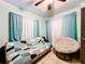 Cozy bedroom with a comfy chair and sofa at 2920 Gause St, Bartow, FL 33830