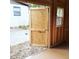 Unfinished workshop interior with plywood walls and flooring at 2920 Gause St, Bartow, FL 33830