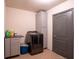 Laundry room with washer, dryer, cabinets, and counter space at 2920 Gause St, Bartow, FL 33830