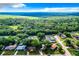 Aerial view showing a home nestled in a lush, wooded neighborhood at 2920 Gause St, Bartow, FL 33830