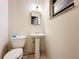 Simple bathroom with pedestal sink and toilet at 2920 Gause St, Bartow, FL 33830