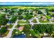 Wide aerial view of neighborhood with houses and green spaces at 2920 Gause St, Bartow, FL 33830