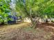 Large backyard with mature trees and a shed at 2920 Gause St, Bartow, FL 33830