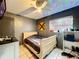 Bedroom with a sleigh bed and ceiling fan at 2920 Gause St, Bartow, FL 33830