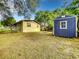 House and shed in a large backyard setting at 2920 Gause St, Bartow, FL 33830