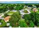 Aerial view of neighborhood with houses and green spaces at 2920 Gause St, Bartow, FL 33830