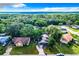 Aerial view of a residential property with a large yard and driveway at 2920 Gause St, Bartow, FL 33830