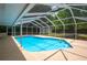 Relaxing screened-in pool area, perfect for outdoor enjoyment at 656 Lorraine Cir, Lake Wales, FL 33853