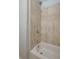 Bathroom with a shower and tile surround at 656 Lorraine Cir, Lake Wales, FL 33853