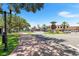 Quaint town square with clock tower and shops at 192 Viola Dr, Auburndale, FL 33823