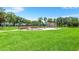 Park with playground and lush green lawn at 192 Viola Dr, Auburndale, FL 33823