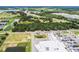 Aerial view of commercial area near a lake and highway at 192 Viola Dr, Auburndale, FL 33823
