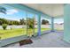 Spacious screened patio overlooking a large backyard at 192 Viola Dr, Auburndale, FL 33823