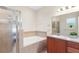 Bathroom with soaking tub and shower at 192 Viola Dr, Auburndale, FL 33823