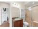 Bathroom with shower, single vanity, and toilet at 192 Viola Dr, Auburndale, FL 33823