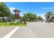 View of town square with clock tower and street at 192 Viola Dr, Auburndale, FL 33823