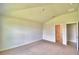 Large main bedroom with carpet and en-suite bathroom access at 1234 Tagliamento Ln, Haines City, FL 33844