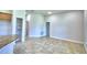 Dining area with tile floor and view of kitchen and backyard at 1269 Tagliamento Ln, Haines City, FL 33844