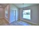 Bright dining area with tile floors and backyard view at 1269 Tagliamento Ln, Haines City, FL 33844
