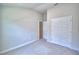 Spacious bedroom with double doors to closet at 1269 Tagliamento Ln, Haines City, FL 33844
