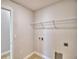 Laundry room with wire shelving and space for washer and dryer at 1269 Tagliamento Ln, Haines City, FL 33844