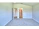 Spacious bedroom with two closets and carpeted floor at 1269 Tagliamento Ln, Haines City, FL 33844