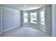 Bright bedroom with bay window and plush carpeting at 1269 Tagliamento Ln, Haines City, FL 33844