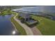 Lakeside gazebo with grills and walking path at 3093 Dunmore Dr, Lake Wales, FL 33859