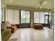 Relaxing sunroom with tiled floors and plenty of natural light at 3093 Dunmore Dr, Lake Wales, FL 33859