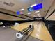 Modern bowling alley with multiple lanes and screens at 3093 Dunmore Dr, Lake Wales, FL 33859