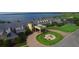 Elegant clubhouse entrance with fountain and landscaping at 3093 Dunmore Dr, Lake Wales, FL 33859