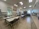Community craft room with tables and chairs at 3093 Dunmore Dr, Lake Wales, FL 33859