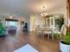 Open living and dining area with hardwood floors at 3093 Dunmore Dr, Lake Wales, FL 33859
