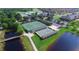 Tennis and shuffleboard courts with covered seating at 3093 Dunmore Dr, Lake Wales, FL 33859