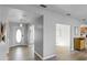 Bright entryway with light gray walls and wood flooring at 1702 Parks Lake Rd, Lake Wales, FL 33898