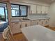 Galley kitchen with ample counter space and dishwasher at 3130 Prairie Dunes W Cir, Lakeland, FL 33810