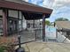 Relaxing pool patio with tables, chairs, and access to the pool at 3130 Prairie Dunes W Cir, Lakeland, FL 33810