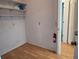 Small pantry with wire shelving and a fire extinguisher at 3130 Prairie Dunes W Cir, Lakeland, FL 33810
